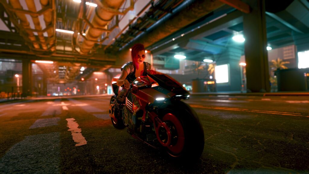 Screenshot aus dem Spiel Cyberpunk 2077 von Nastja the blogging Mox. Weibliche Cyberpunk V auf dem Motorrad fährt durch eine leere Strasse in der Stadt Night City. Symbolbild für die Rubrik Novelle.