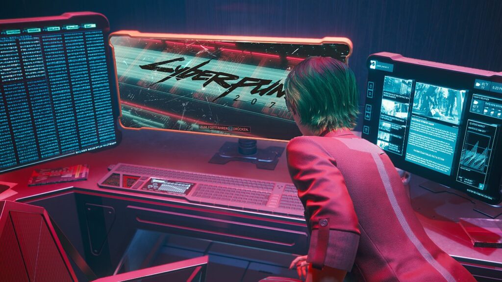 Screenshot aus dem Spiel Cyberpunk 2077 von Nastja the blogging Mox. Weibliche Cyberpunk V steht in einem Büro vor 3 Bildschirmen. Symbolbild für die Rubrik Screenshots aus cyberpunk 2077..