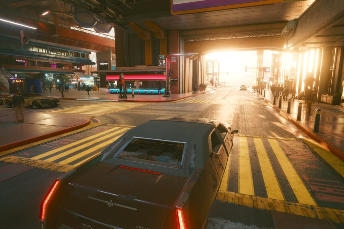 Strassen von Night City, Sonnenaufgang zwischen den Häusern. Screenshot aus dem Spiel Cyberpunk 2077 im Blog von Nastja der Mox.