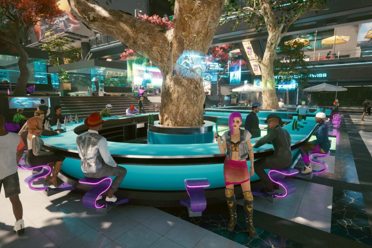 Eine futuristische Outdoor bar in Night City. Screenshot aus dem Spiel Cyberpunk 2077 im Blog von Nastja der Mox.