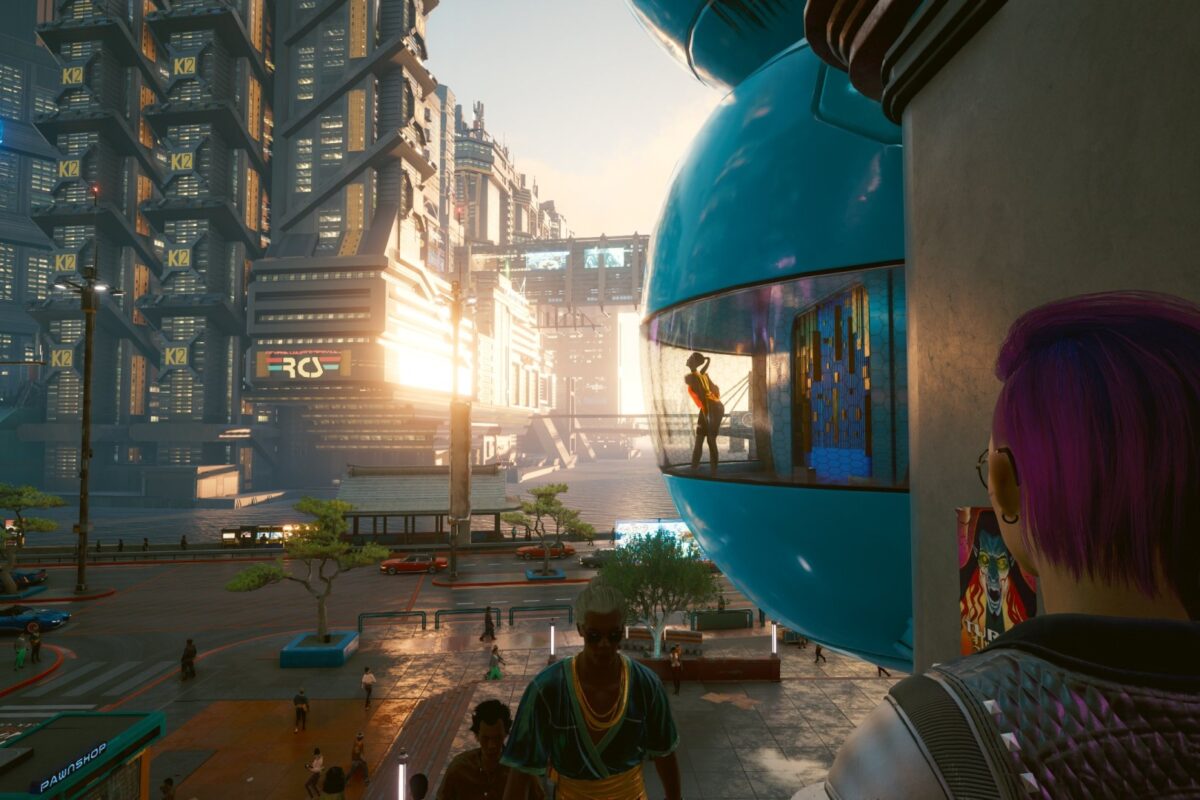 Goldene Skyline von Night City bei Sonnenuntergang. Screenshot aus dem Spiel Cyberpunk 2077 im Blog von Nastja der Mox.