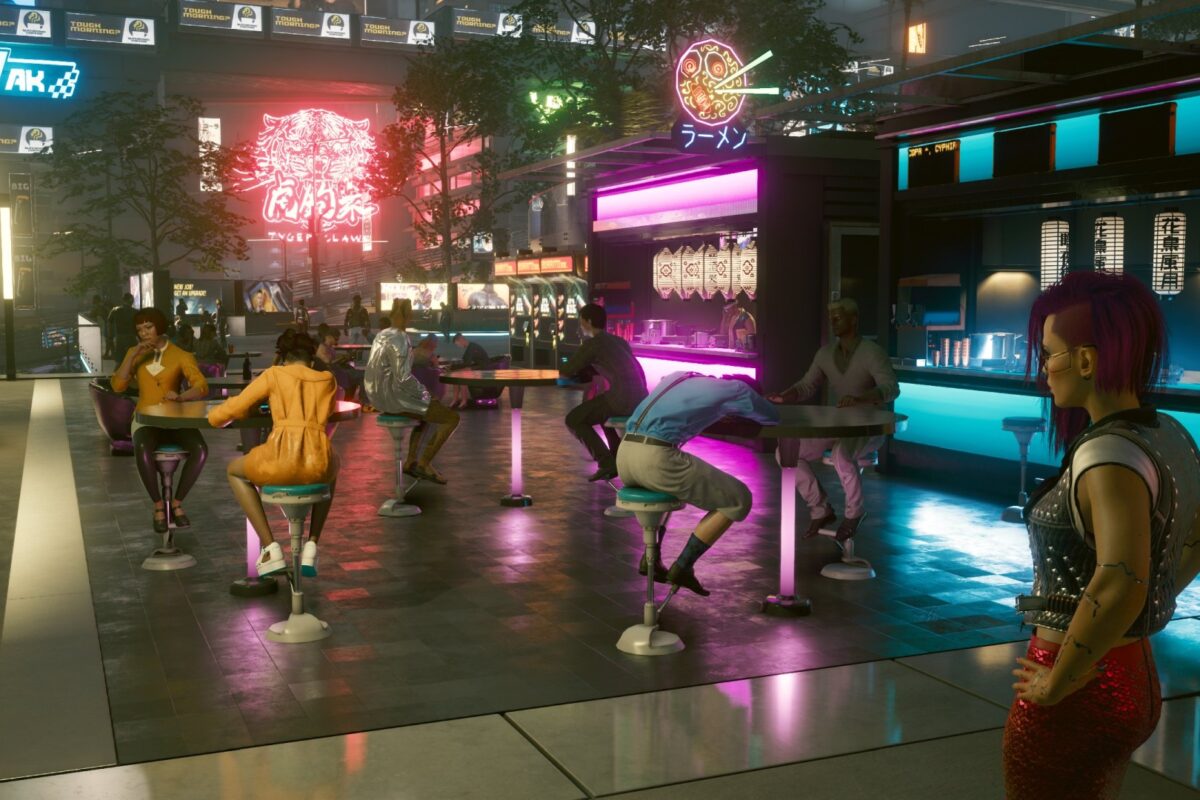 Outdoor bar in Night City bei Nacht und Neonschein. Screenshot aus dem Spiel Cyberpunk 2077 im Blog von Nastja der Mox.