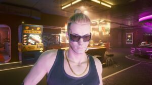 Männlicher Sunnyboy in einer Bar. Screenshot aus dem Spiel Cyberpunk 2077 im Blog von Nastja der Mox. The Nameless of Night City ist eine Würdigung an die Ingame-NPCs.