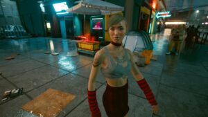 Junge leichtbekleidete Frau nachts unterwegs. Screenshot aus dem Spiel Cyberpunk 2077 im Blog von Nastja der Mox. The Nameless of Night City ist eine Würdigung an die Ingame-NPCs.