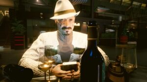 Mann mit weissem Anzug vor Weinglas und Weinflasche. Screenshot aus dem Spiel Cyberpunk 2077 im Blog von Nastja der Mox. The Nameless of Night City ist eine Würdigung an die Ingame-NPCs.