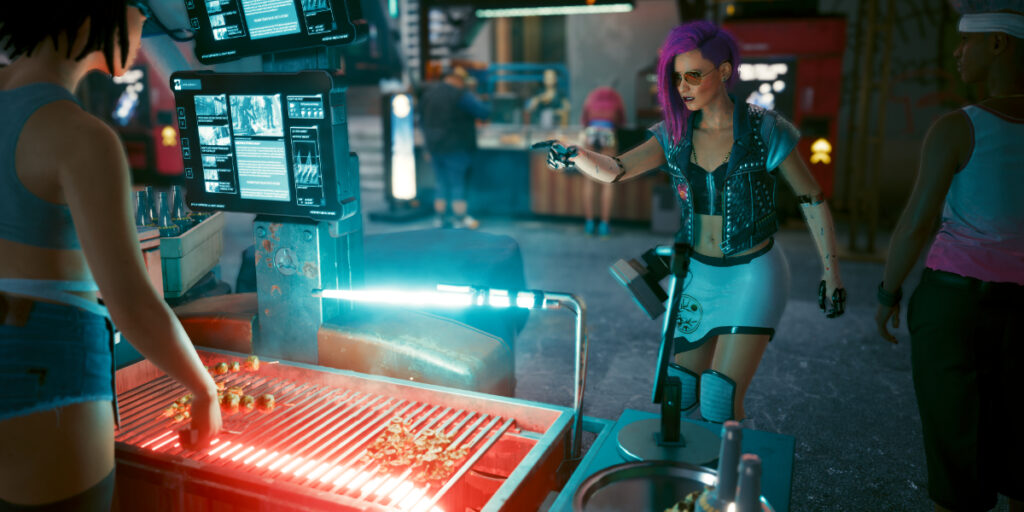 Frau auf einem Markt in Night City an einem Fast-Food-Stand. Screenshot aus dem Spiel Cyberpunk 2077.