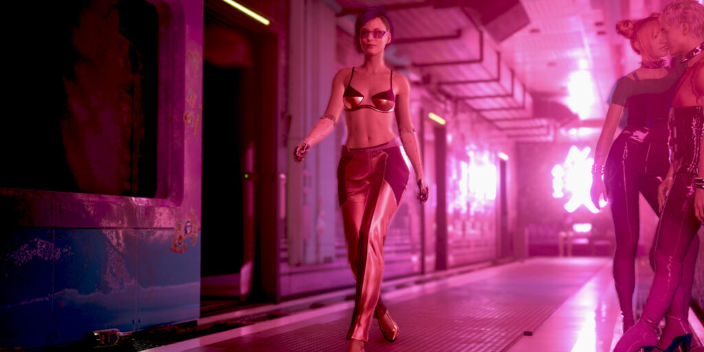 Leichtbekleidete Frau in einem Rotlichtmilleu. Screenshot aus dem Spiel Cyberpunk 2077