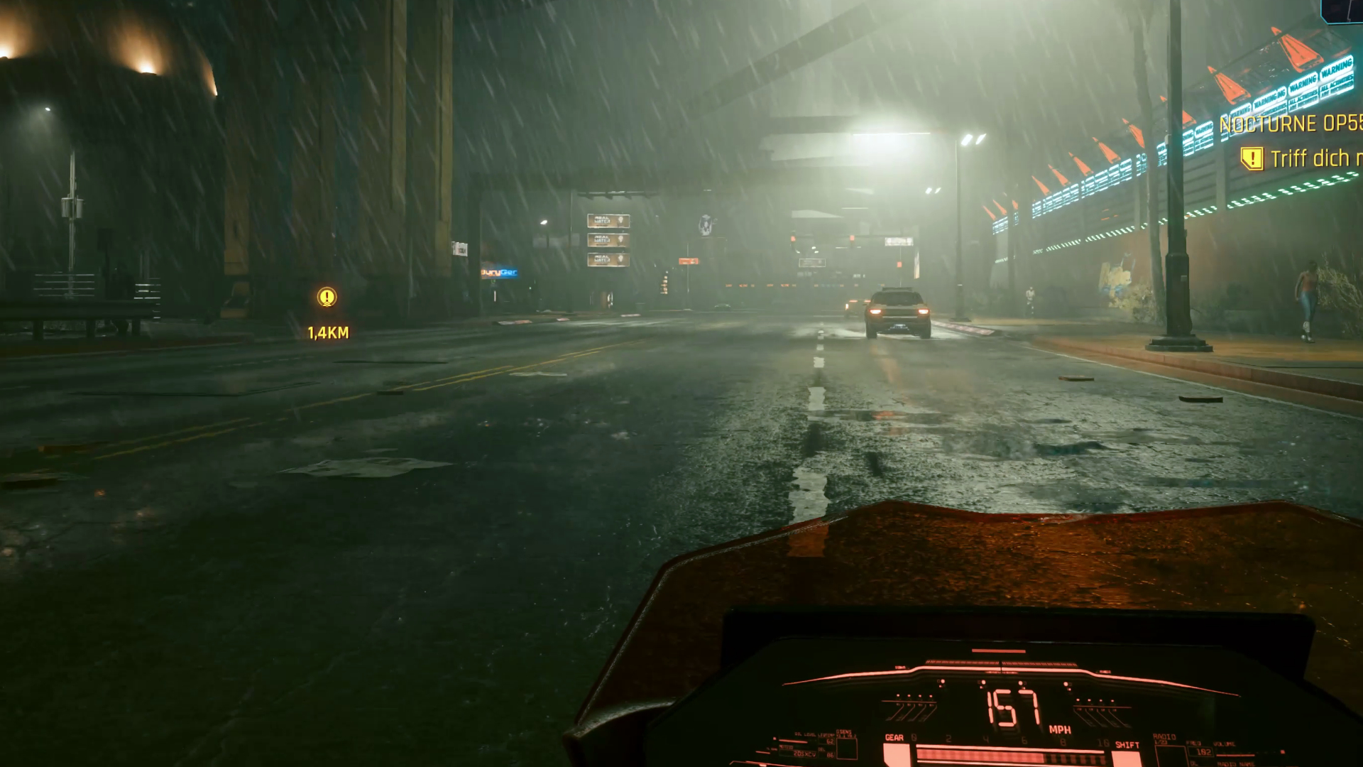Auf dem Motorrad durch das regnerische Night City. Screenshot aus dem Spiel Cyberpunk 2077